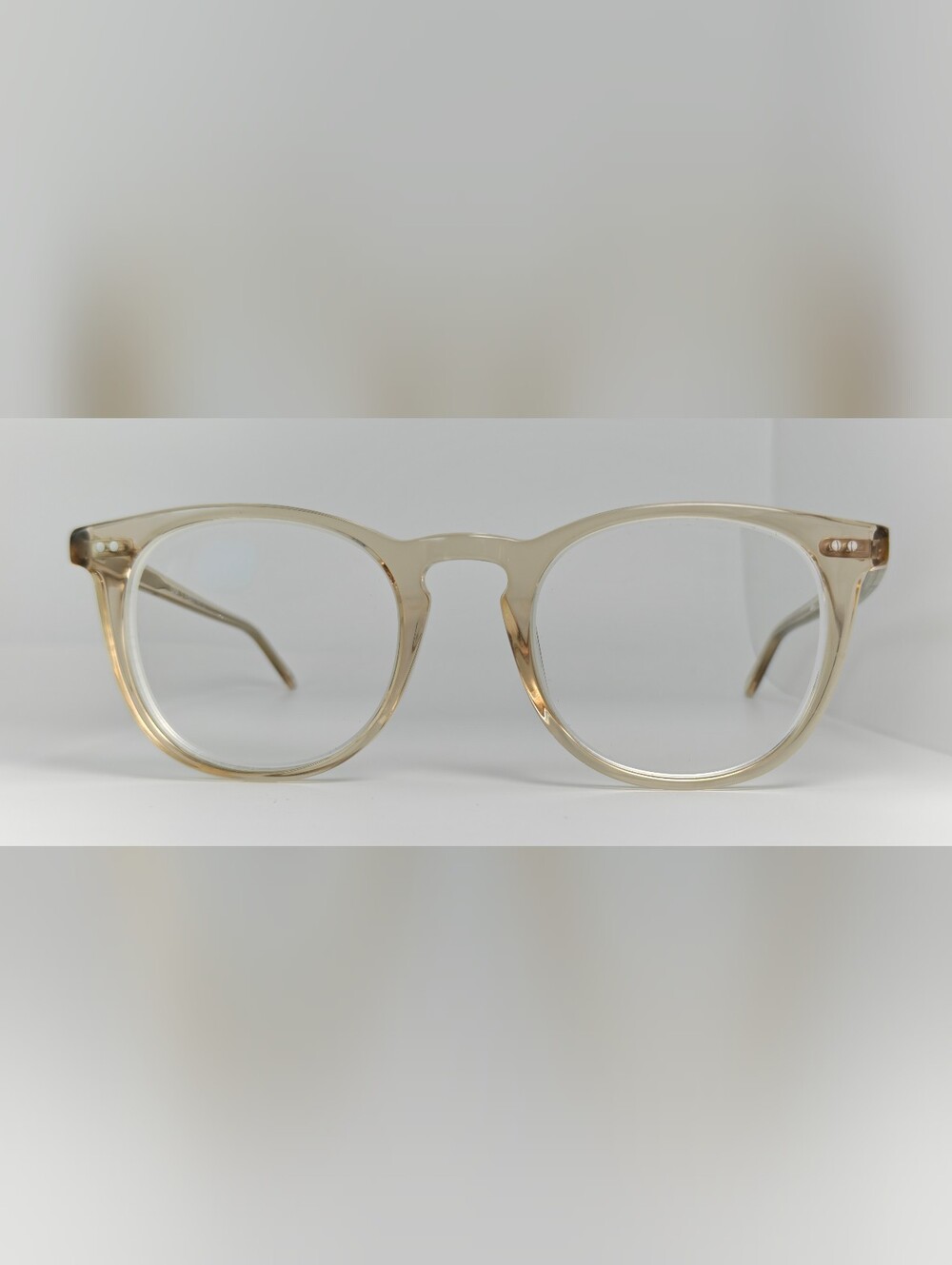 Ona. RFLKT. Clear Beige Round Frame Glasses.
